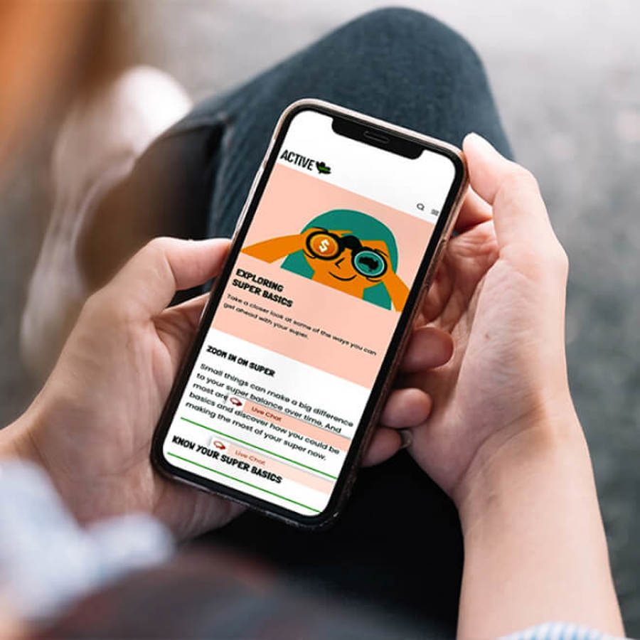 Hand holding mobile phone displaying Active Super website