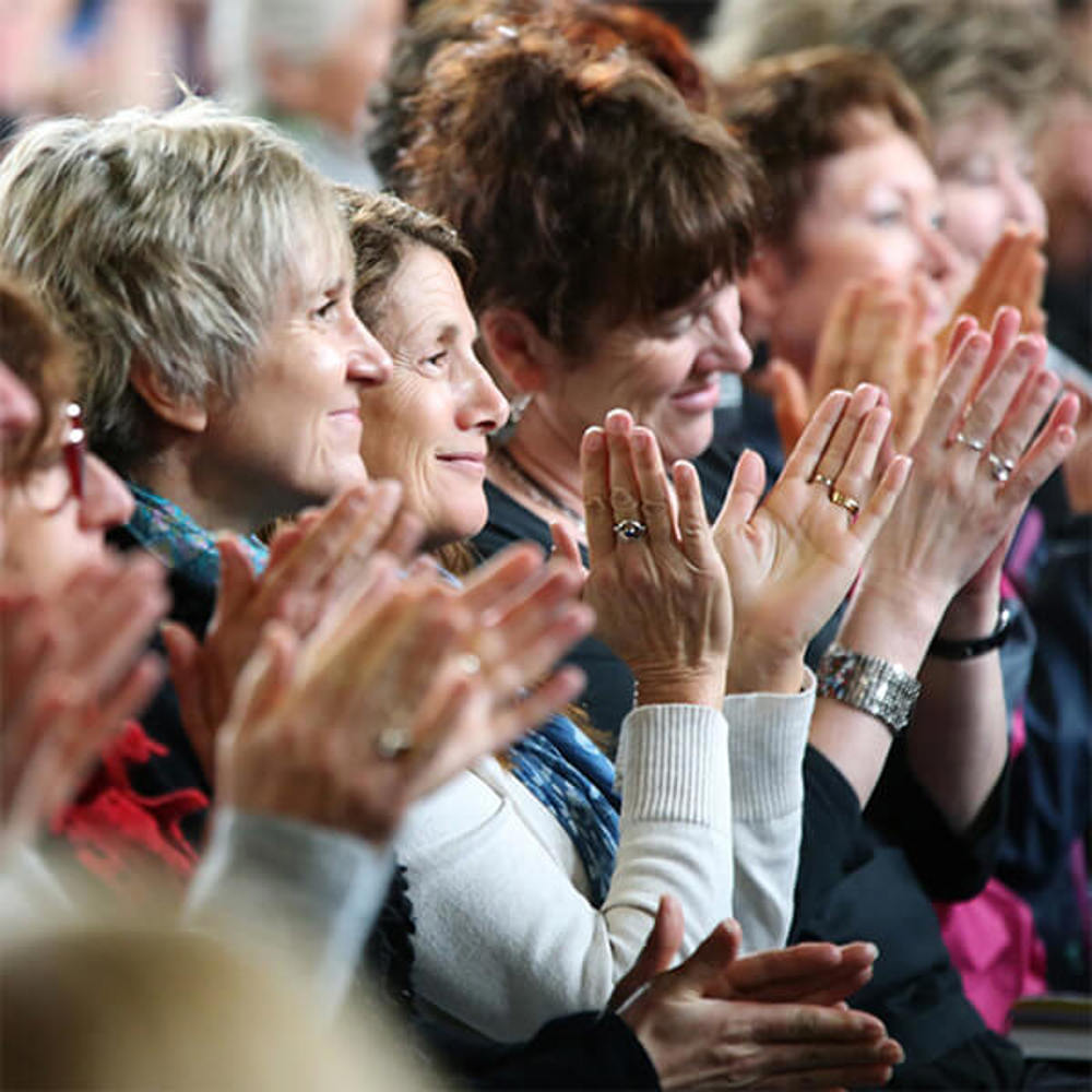 Image of crowd from Sydney Writers Festival clapping hands showing huge volume of traffic hitting the site at once upon the opening of the Festival