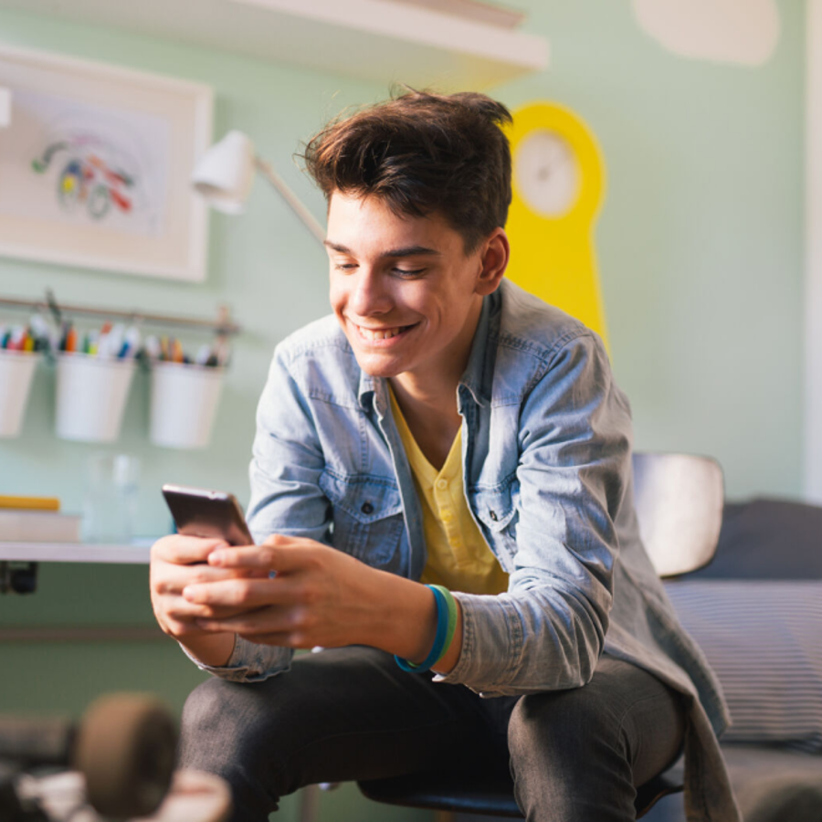 Screenshot of young male using ReachOut PeerChat app on mobile device